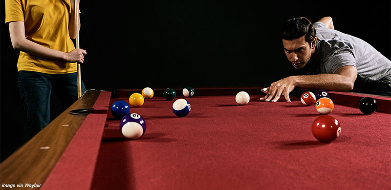 Couple Playing Billiards